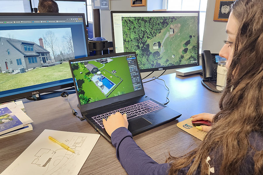 A celebrated pool designer shaping a fresh vision for a new pool design, showcasing premier luxury installation in NY and CT